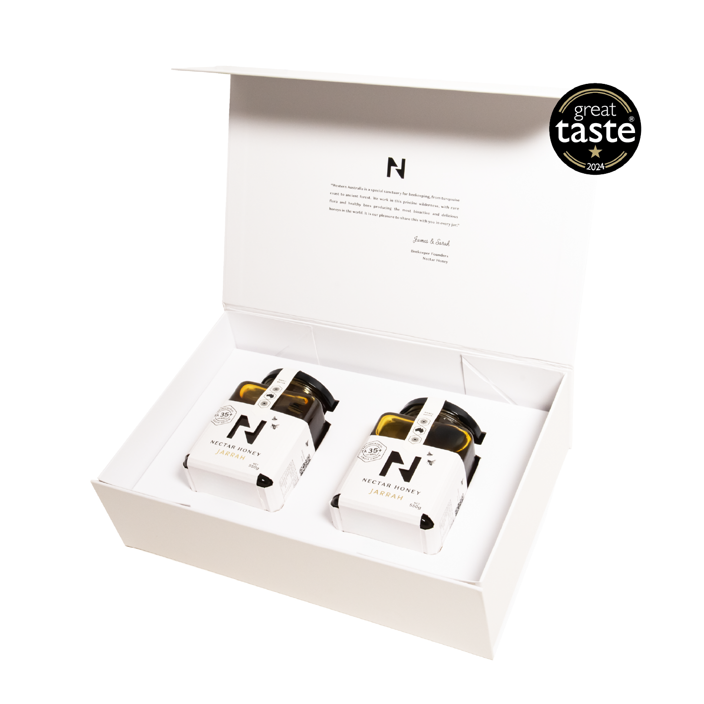 Two white containers with black labels in a white box, featuring a 'Great Taste' award badge.