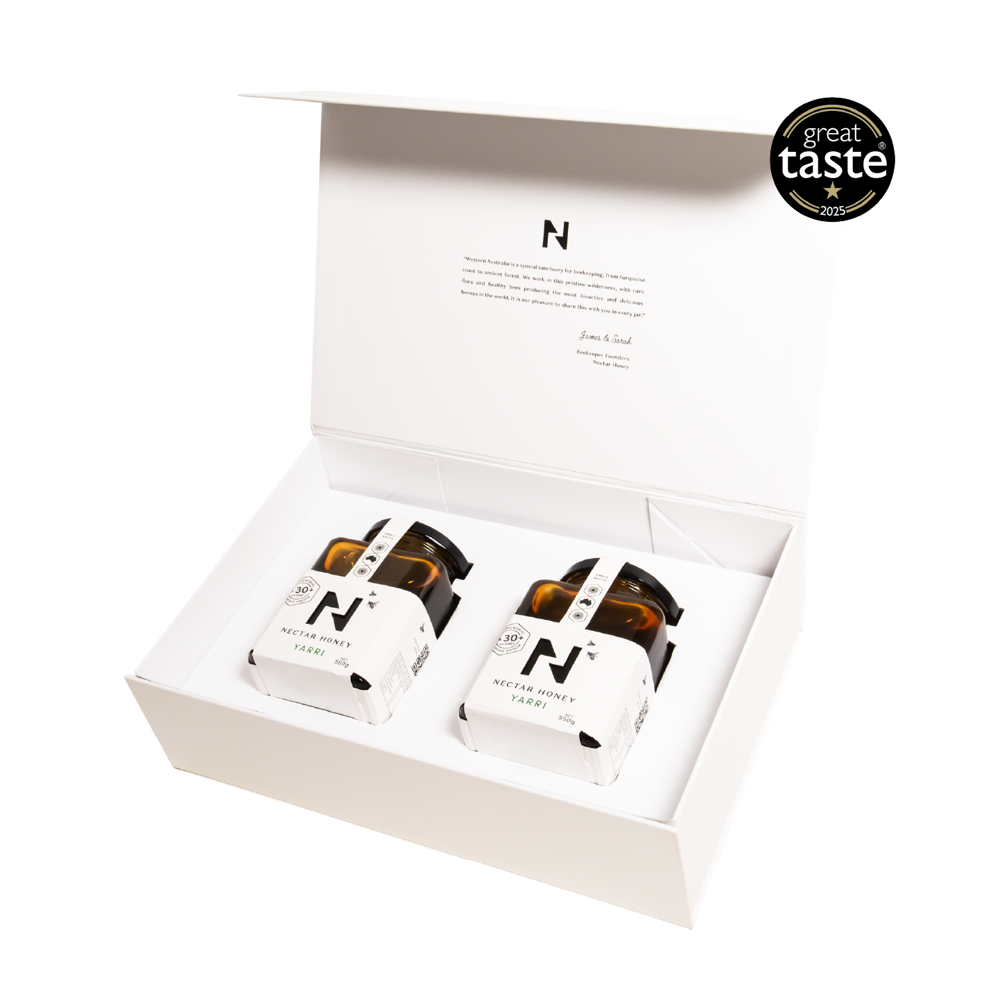 Two jars of honey in a white gift box with 'Great Taste' award logo.