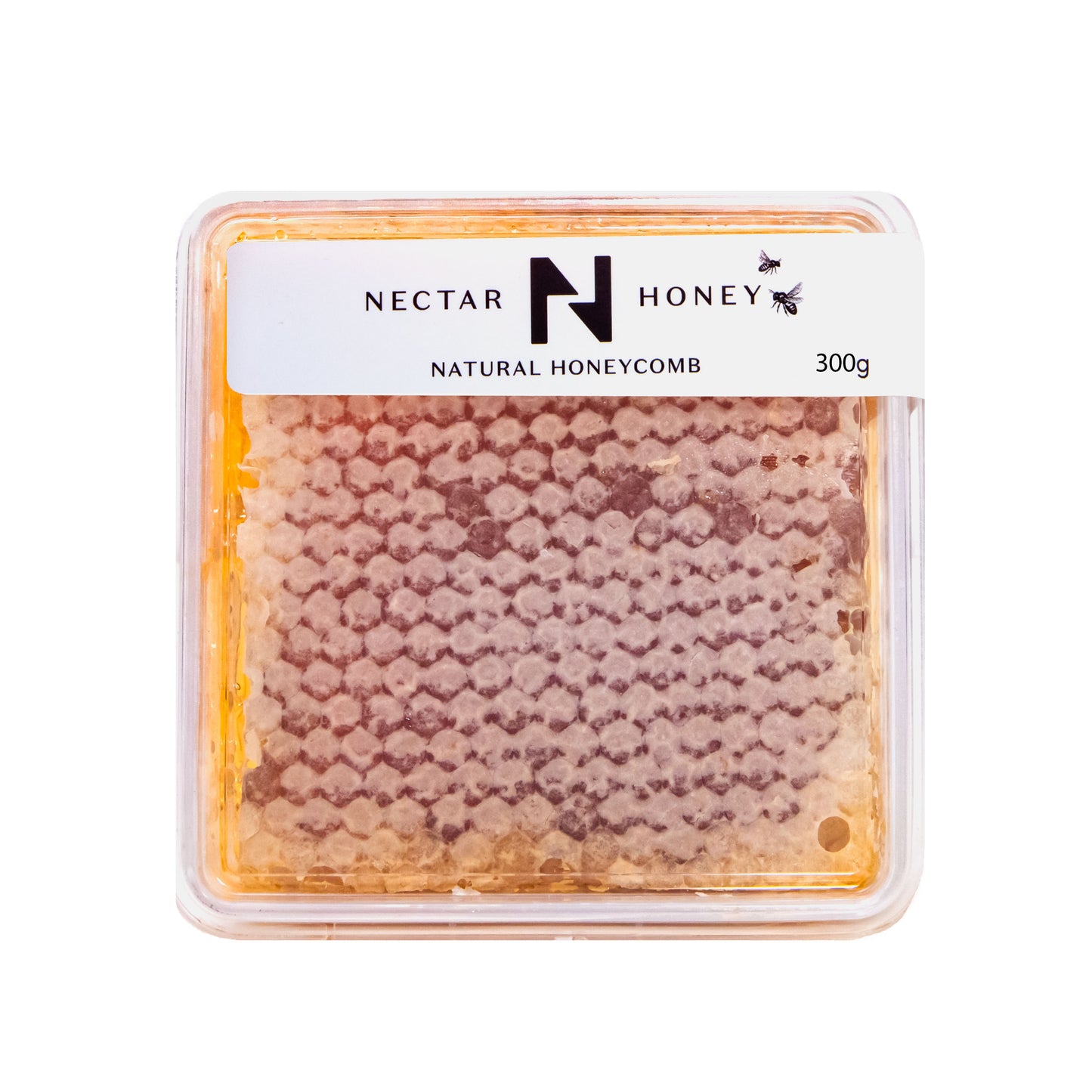 Packaged fresh cut honeycomb by Nectar Honey in a clear plastic container with a white label that reads 'Natural Honeycomb 300g'.