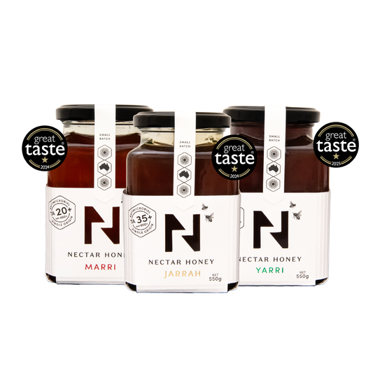 Three jars of Nectar Honey with 'Great Taste' awards on a white background