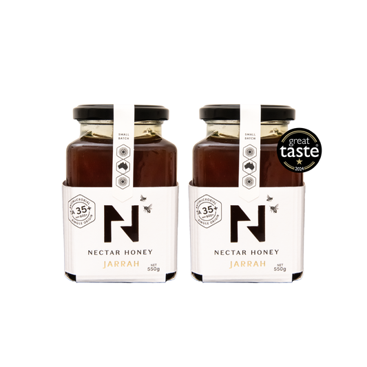 Two jars of Nectar Honey with a 'Great Taste' award on a white background